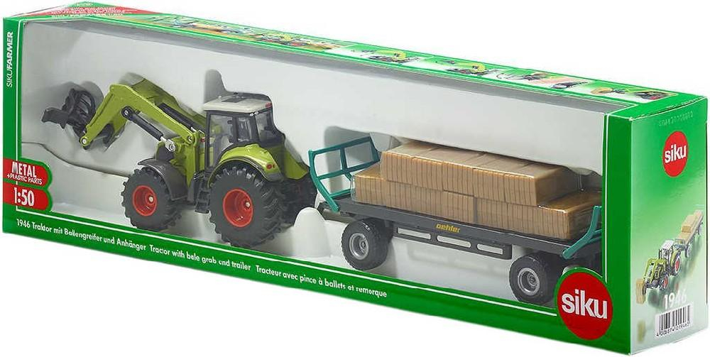 ds52172279_siku_traktor_s_balikovacim_nastavcem_a_vlekem_1_50_model_kov_1946_1
