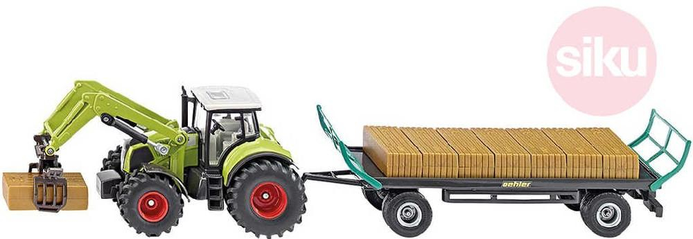 ds52172279_siku_traktor_s_balikovacim_nastavcem_a_vlekem_1_50_model_kov_1946_2