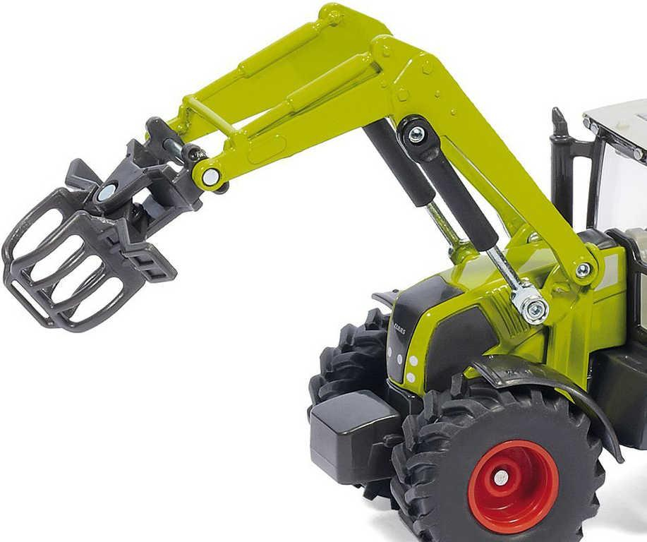 ds52172279_siku_traktor_s_balikovacim_nastavcem_a_vlekem_1_50_model_kov_1946_6