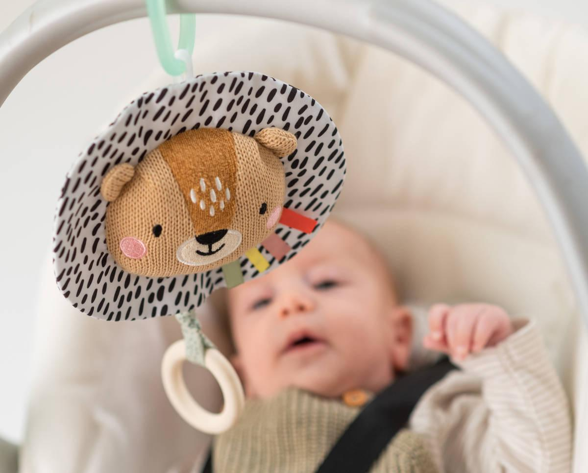 TAF TOYS Baby lev Harry textilní hudební natahovací s melodií pro miminko
