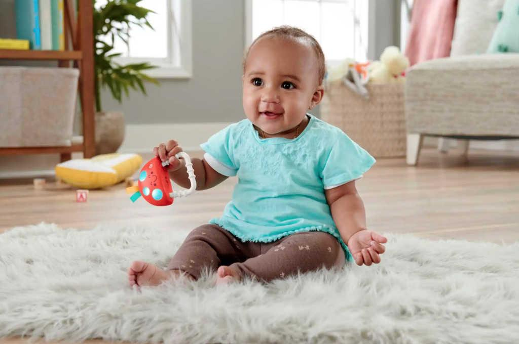FISHER PRICE Baby kousátko chrastítko muchomůrka pro miminko na baterie Světlo